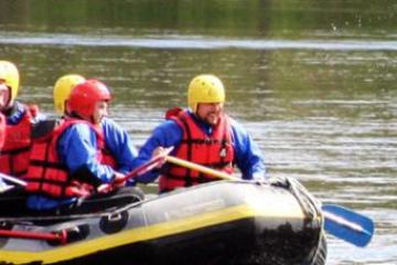 a man flipping off a raft