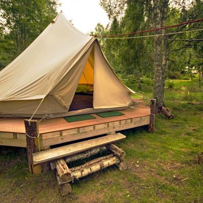 a tent on a wooden platform