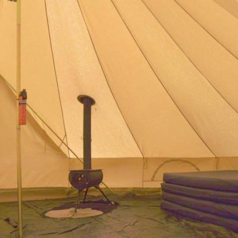 wood stove in a tent