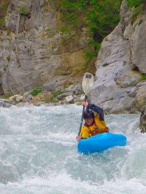 tom kayaking in the alps